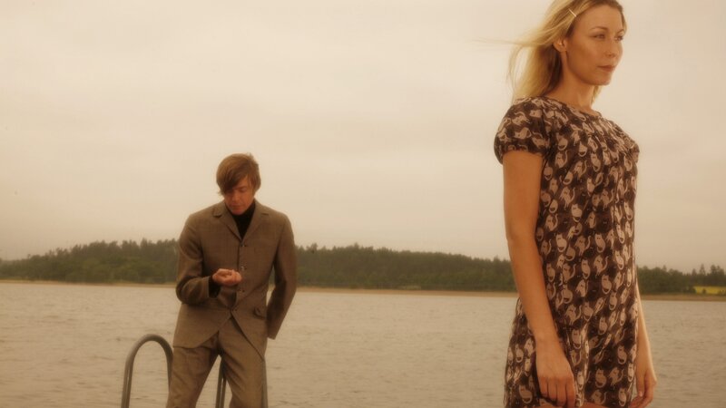Couple on a dock by the water