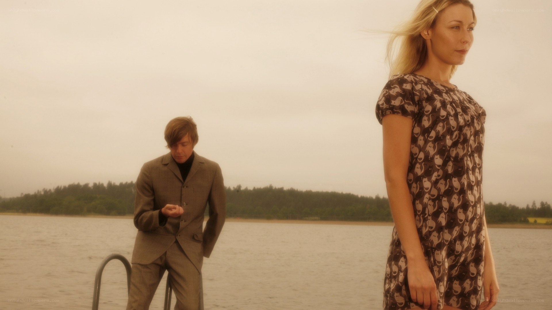 Couple on a dock by the water