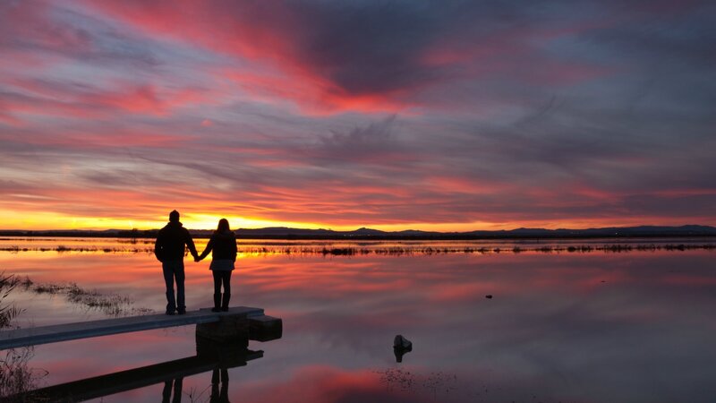 Couple on a Dock — Red, Dramatic