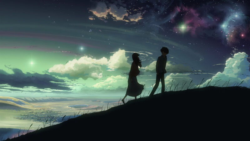 couple on a hill under stars