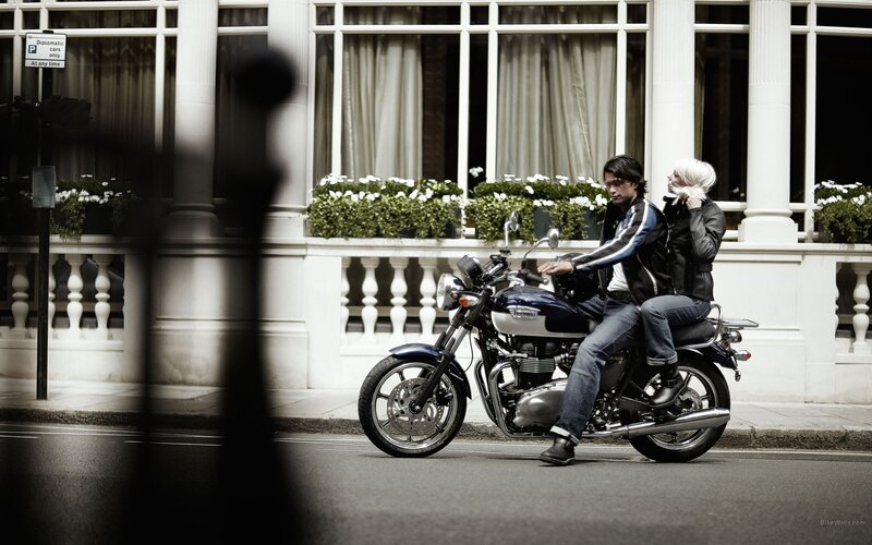 Couple on a motorcycle in the city