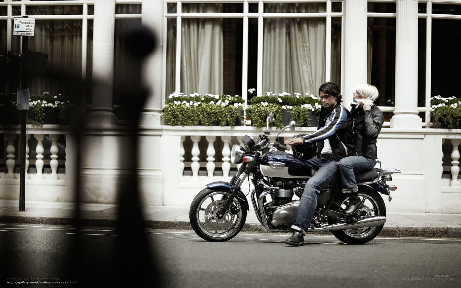 Couple on a motorcycle in the city