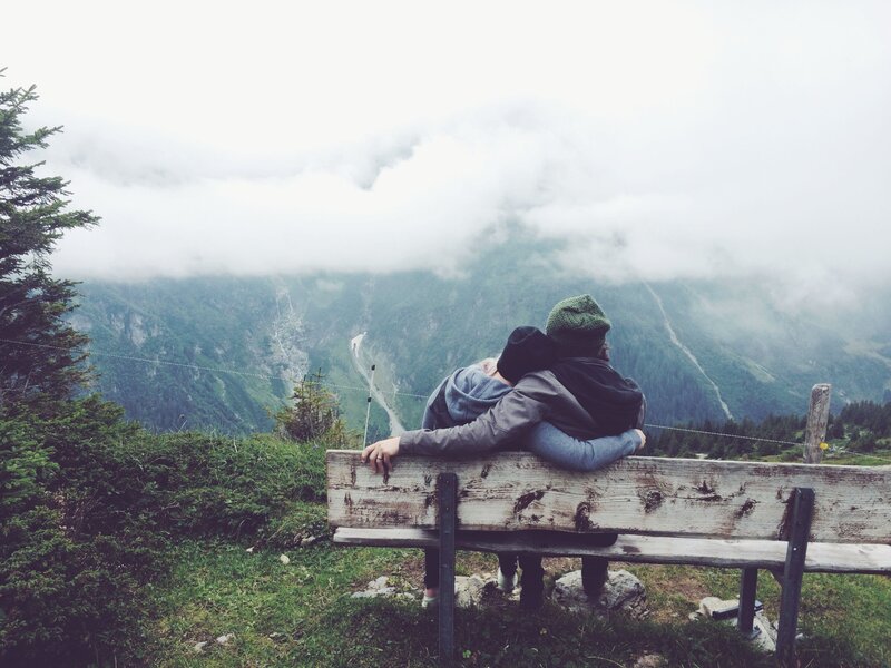 Couple on a mountain bench