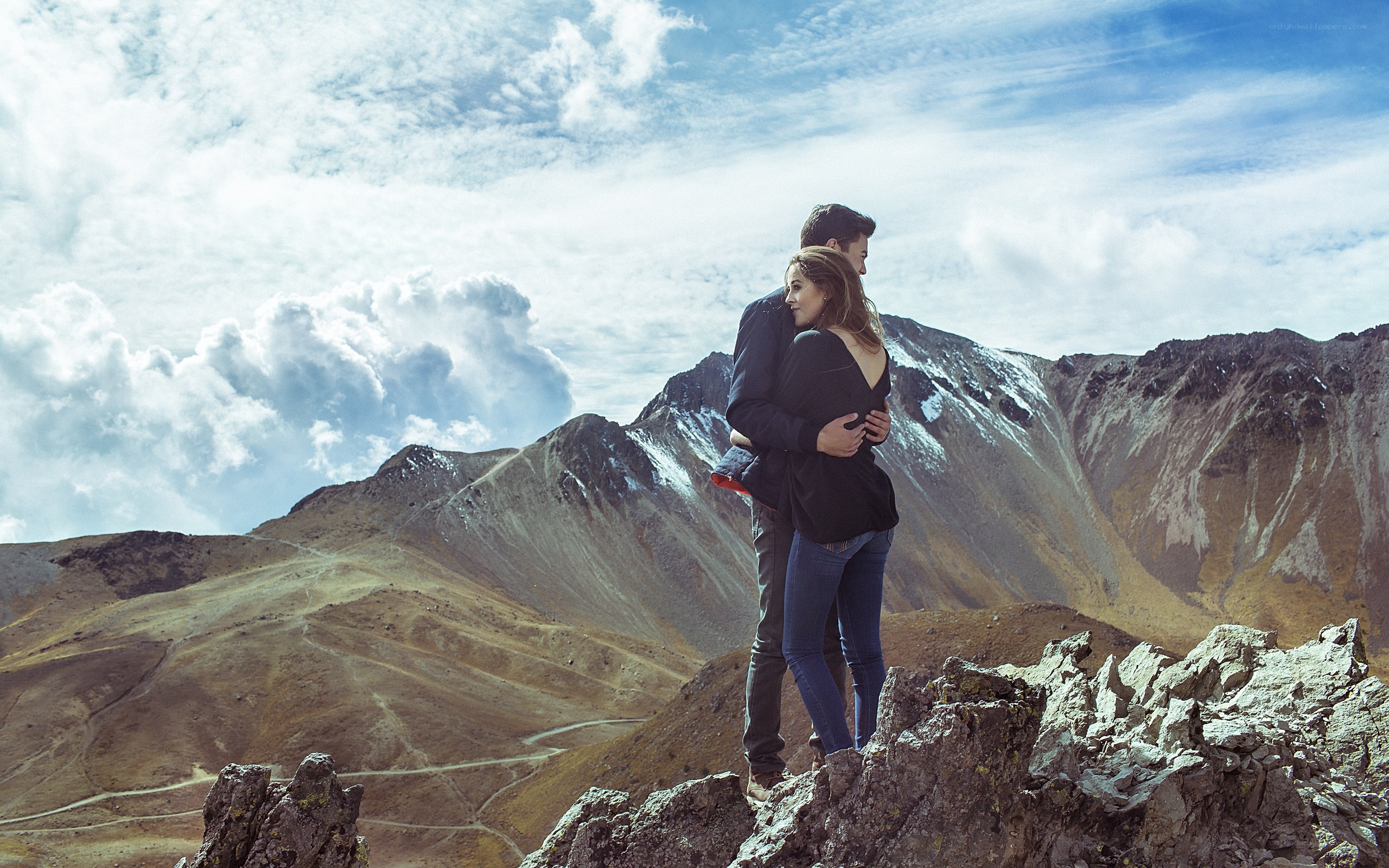 Couple on a mountain peak