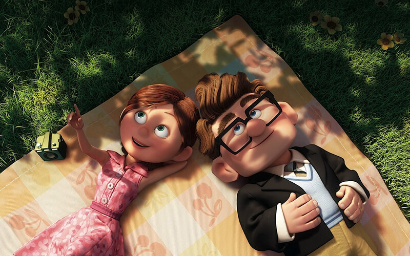 Couple on a picnic blanket