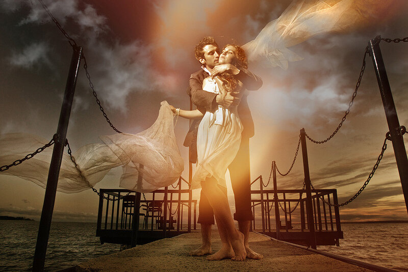 Couple on a Pier — Orange, Dramatic