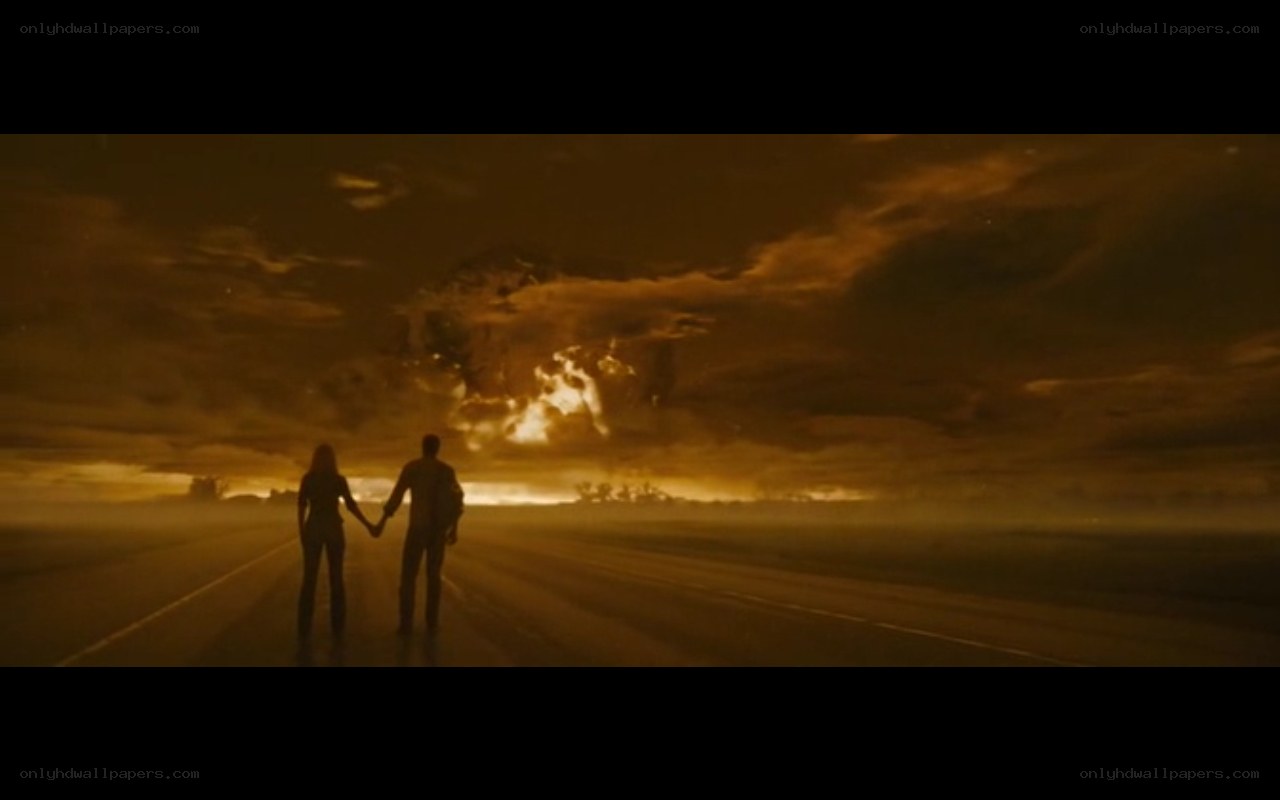 couple on a road at sunset