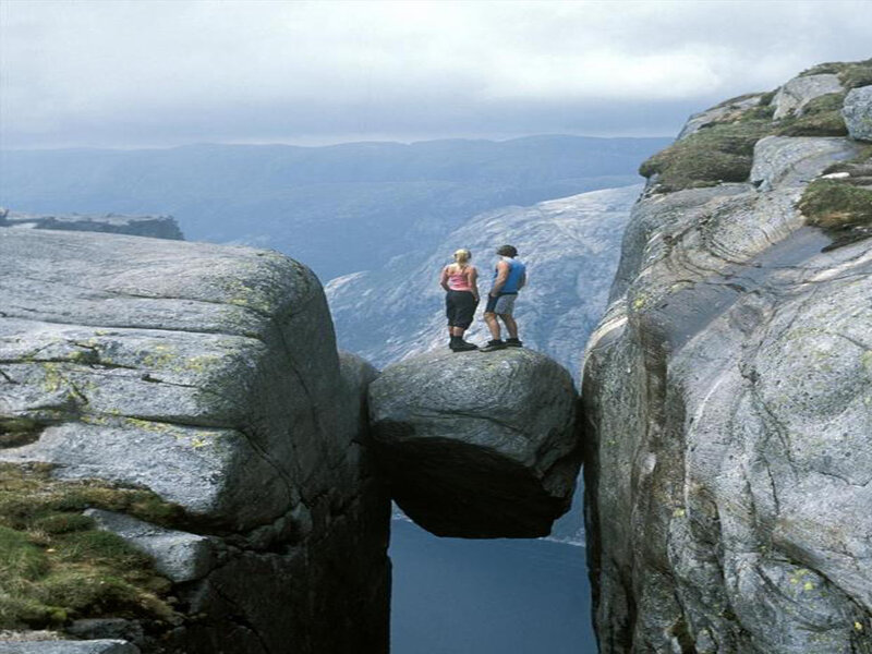 Couple on a Rock Formation — Gray