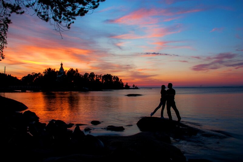 Couple on a Rock — Orange, Serene