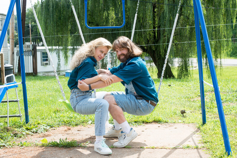 Couple on a swing set