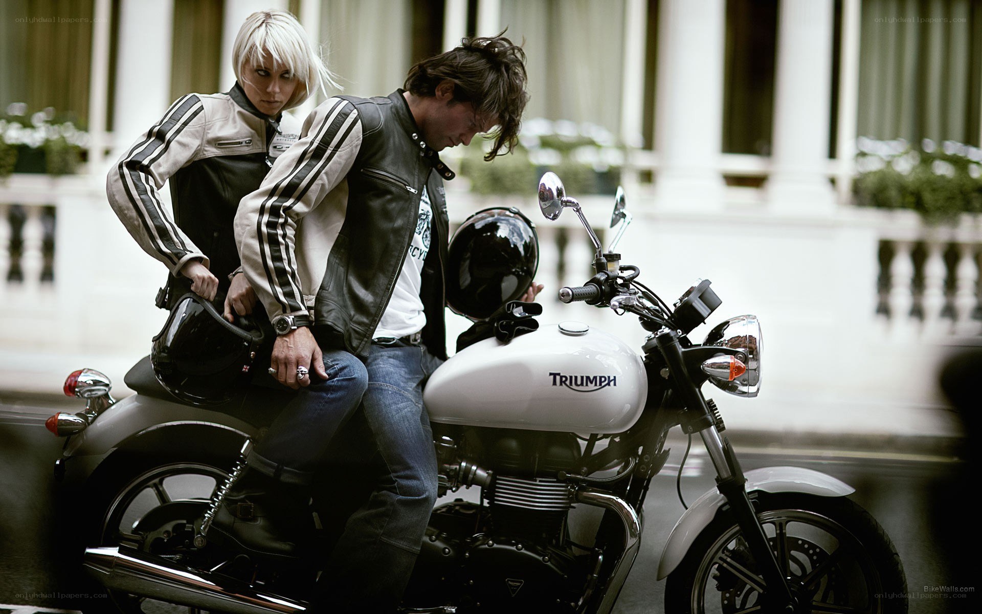 Couple on a Triumph motorcycle