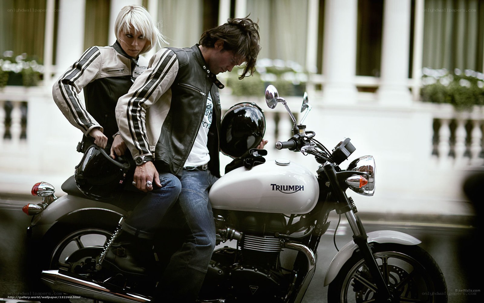 Couple on a Triumph motorcycle