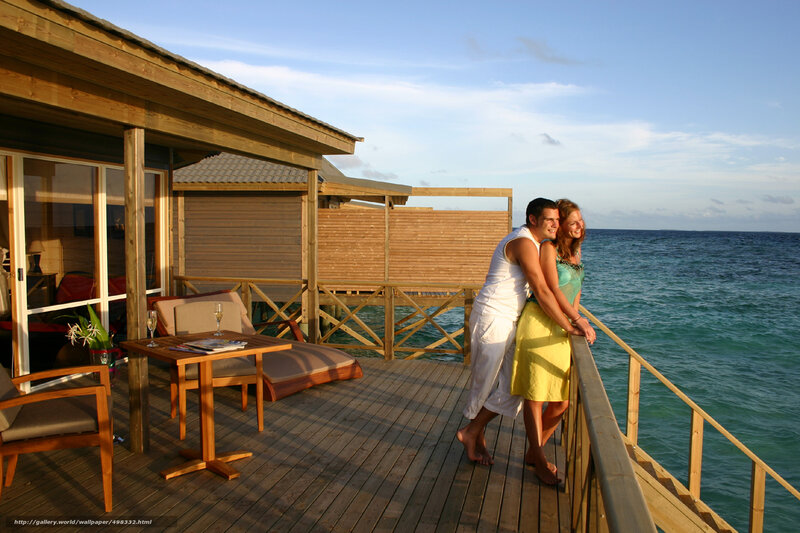 Couple on a tropical deck