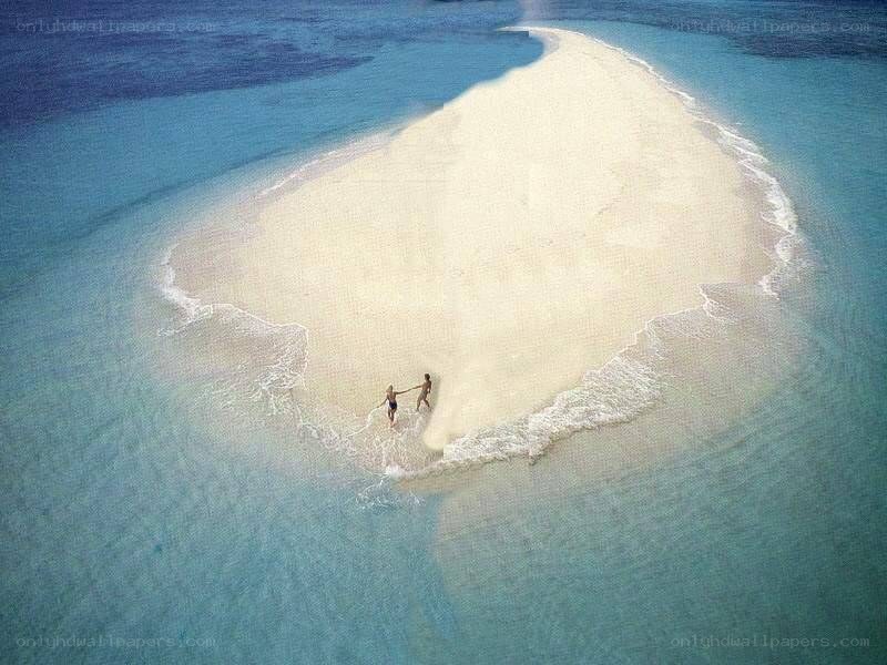 Couple on a tropical sandbar