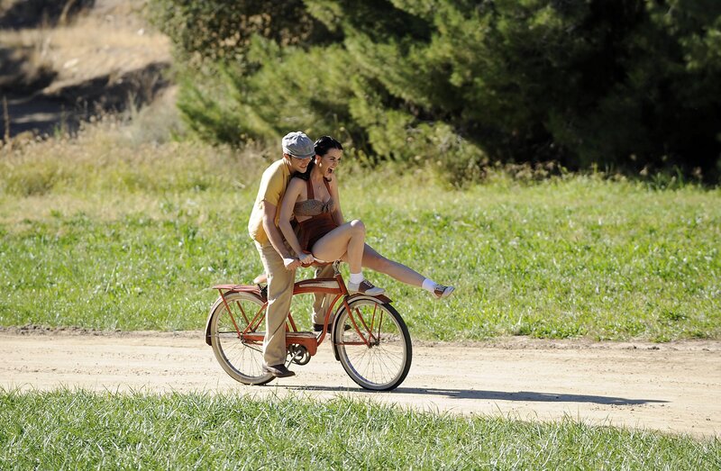 Couple on a vintage bicycle