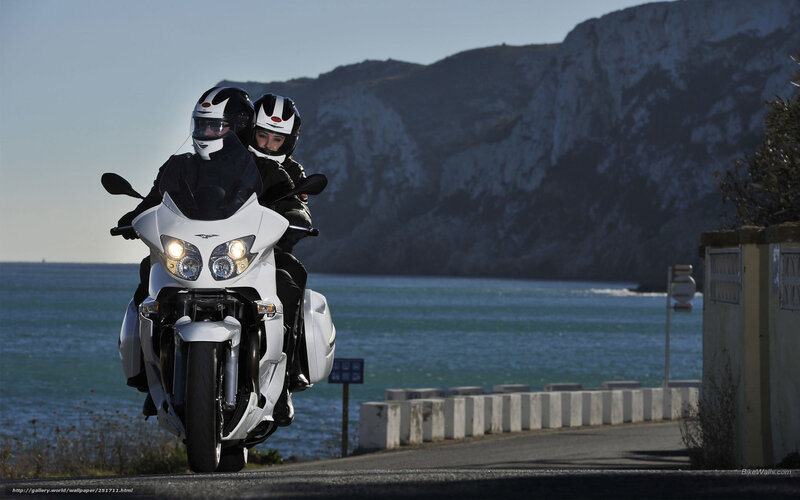 Couple on a white motorcycle