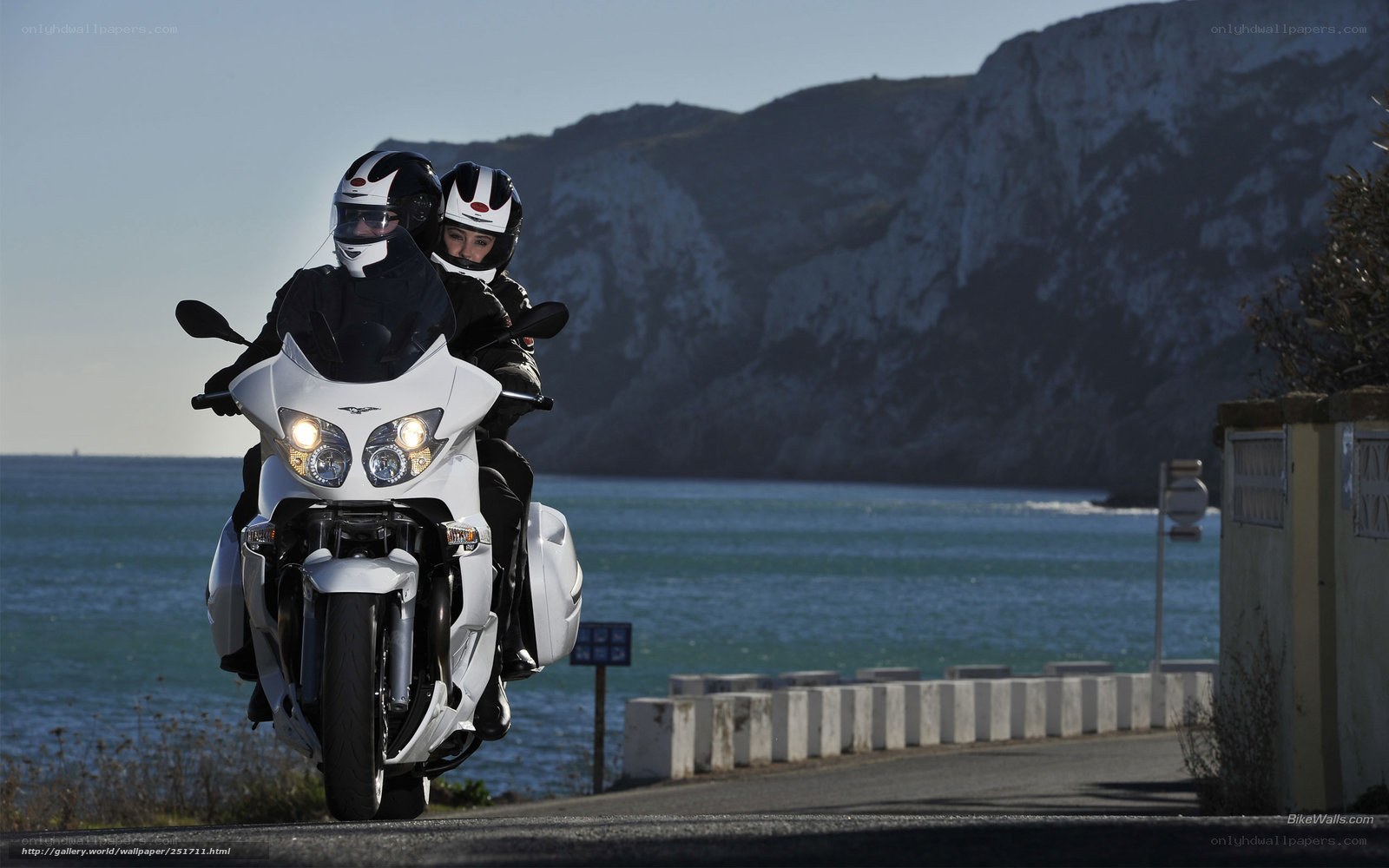 Couple on a white motorcycle