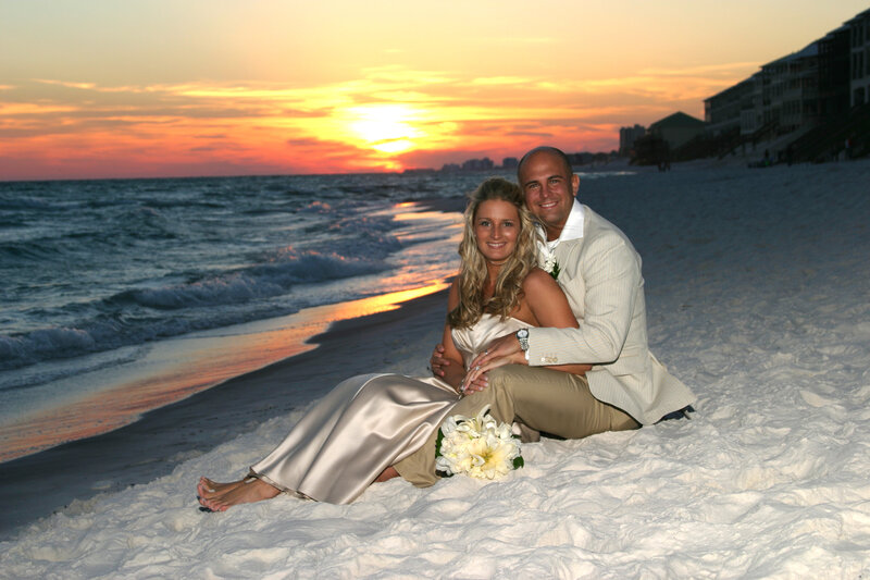 Couple on beach at sunset