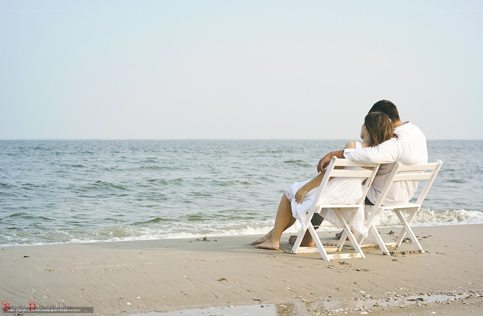 Couple on beach at sunset