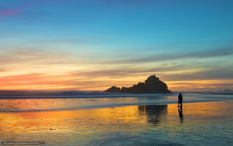 Couple on Beach at Sunset — Blue, Serene, Photograph, Ocean, Rock Formation