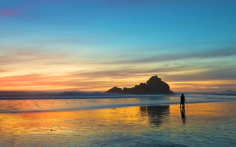 Couple on Beach at Sunset — Blue, Serene, Photograph, Silhouette