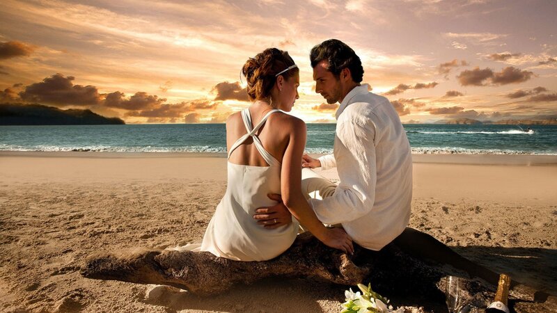Couple on Beach at Sunset — Orange, Serene, Photograph, Driftwood, Ocean