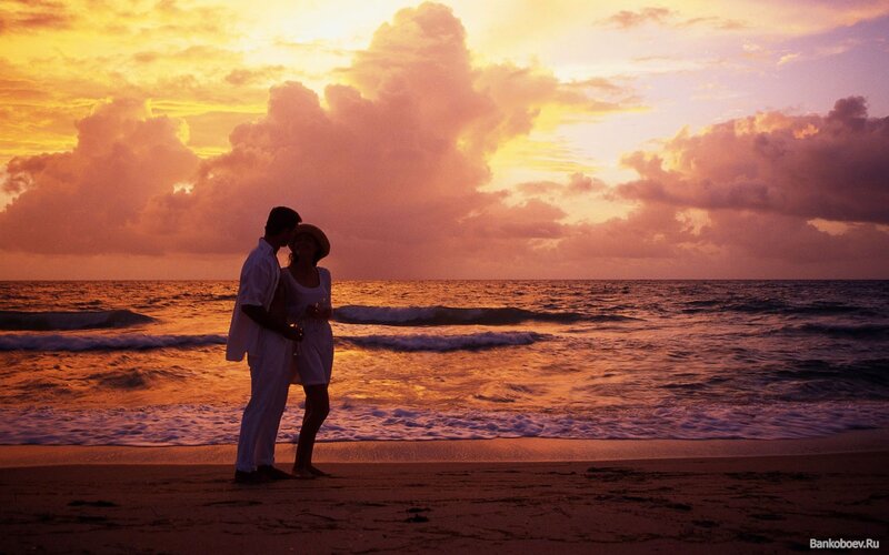 Couple on Beach at Sunset — Orange, Serene, Photograph, Ocean, Sky
