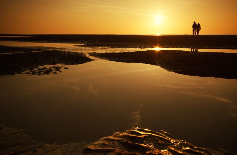 Couple on Beach at Sunset — Orange, Serene, Photograph, Silhouette, Sun