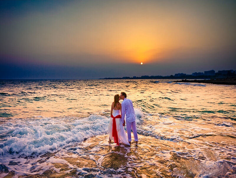 Couple on Beach at Sunset — Orange, Serene, Photograph