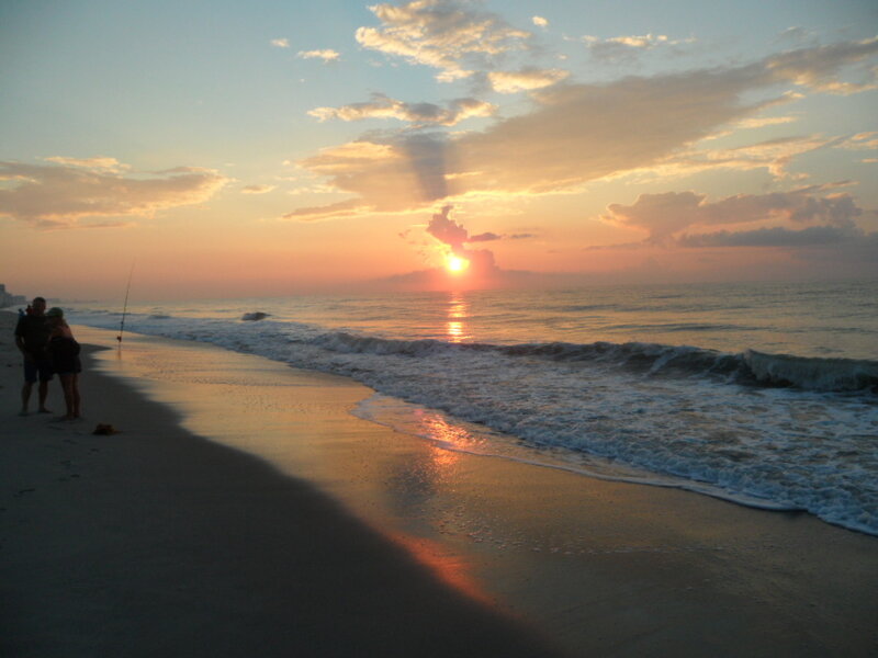 Couple on Beach at Sunset — Orange, Serene