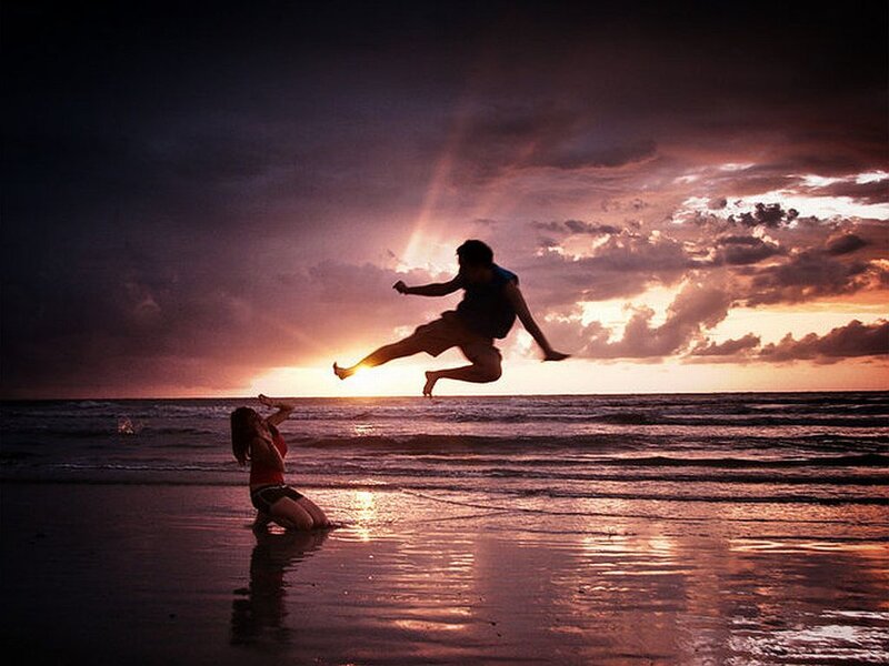 Couple on Beach at Sunset — Purple, Dramatic
