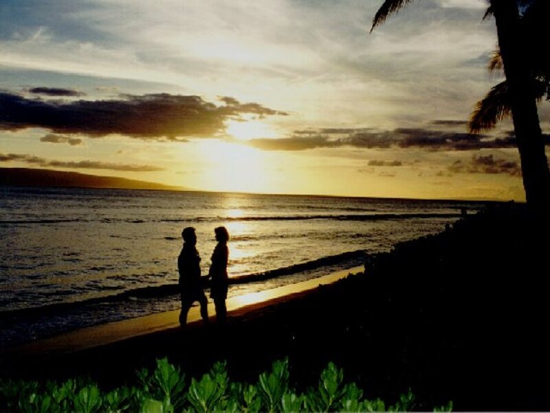 Couple on Beach at Sunset — Yellow, Serene, Photograph, Ocean