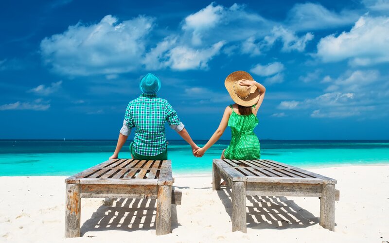 Couple on Beach — Blue, Serene, Afternoon, Photograph, Lounge Chairs