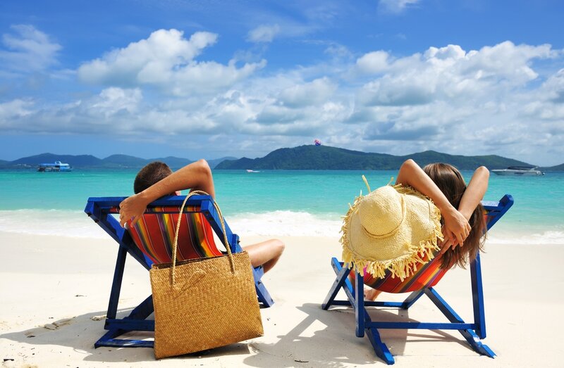 Couple on Beach Chairs — Blue, Relaxed, Afternoon, Photograph, Straw Hat, Beach Bag