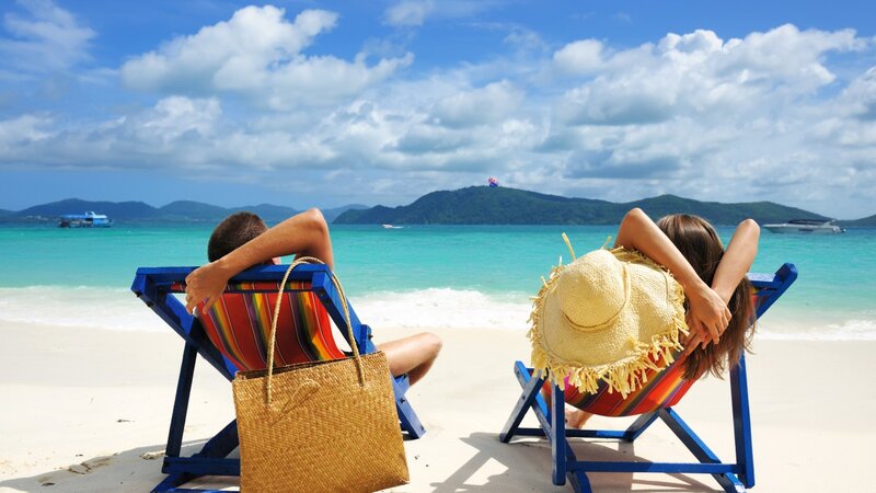 Couple on Beach Chairs — Blue, Relaxed, Afternoon, Photograph, Straw Hat