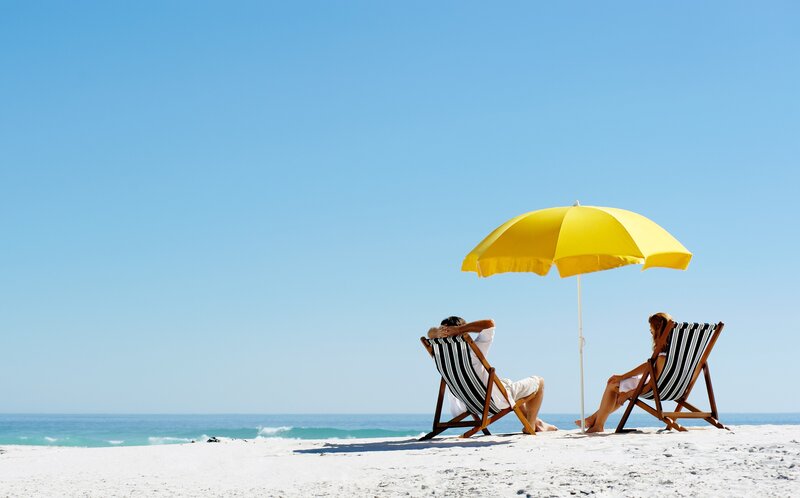 Couple on Beach Chairs — Blue, Relaxed, Afternoon, Photograph, Umbrella