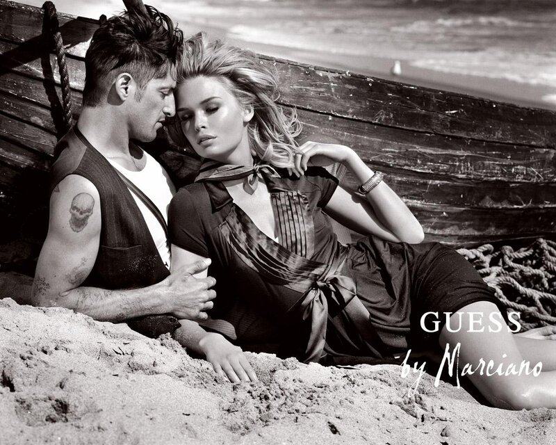 Couple on beach in black and white