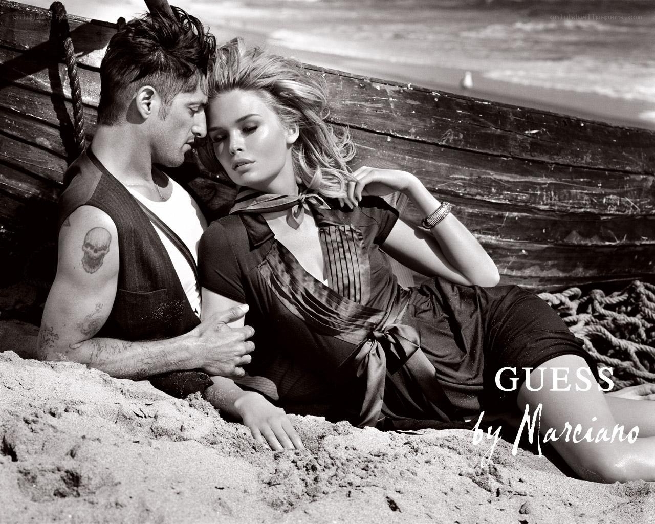 Couple on beach in black and white