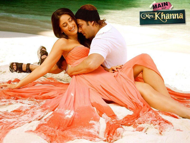 couple on beach in orange dress