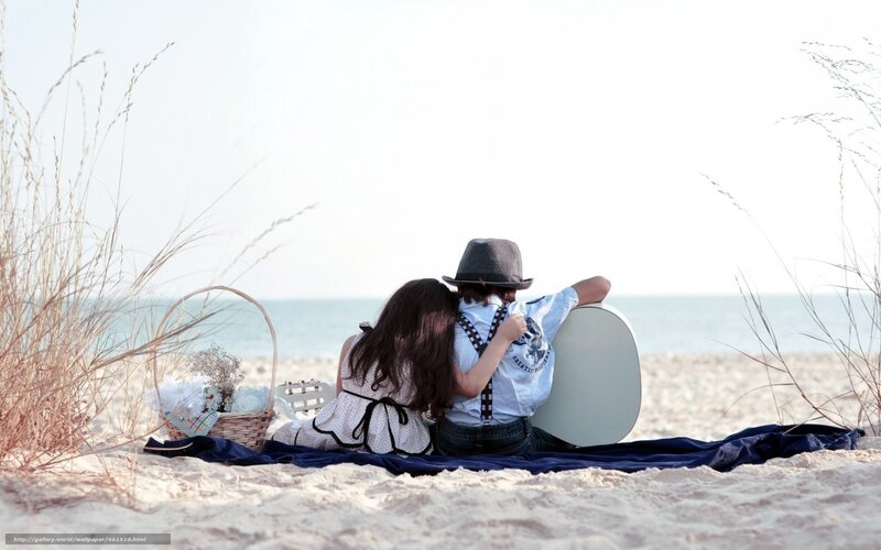 Couple on beach picnic