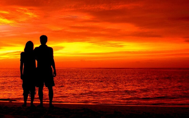 Couple on Beach — Red, Dramatic, Sunset