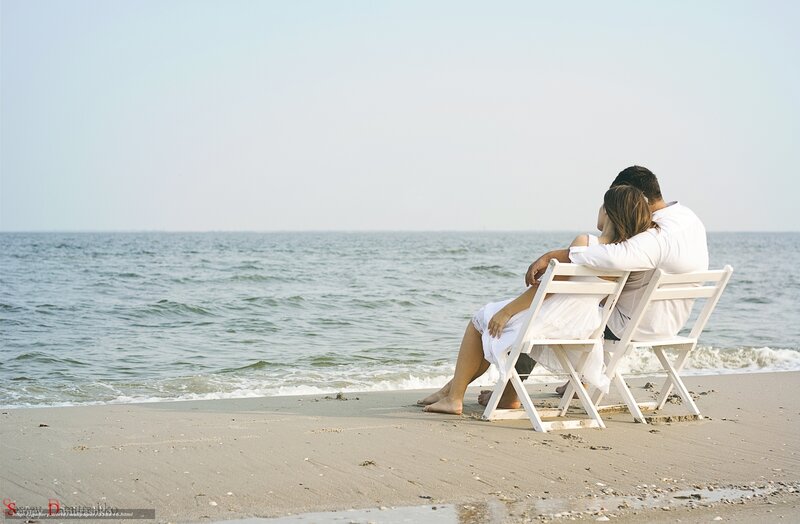 Couple on Beach — White, Serene, Afternoon, Photograph, Chairs, Ocean, Sand