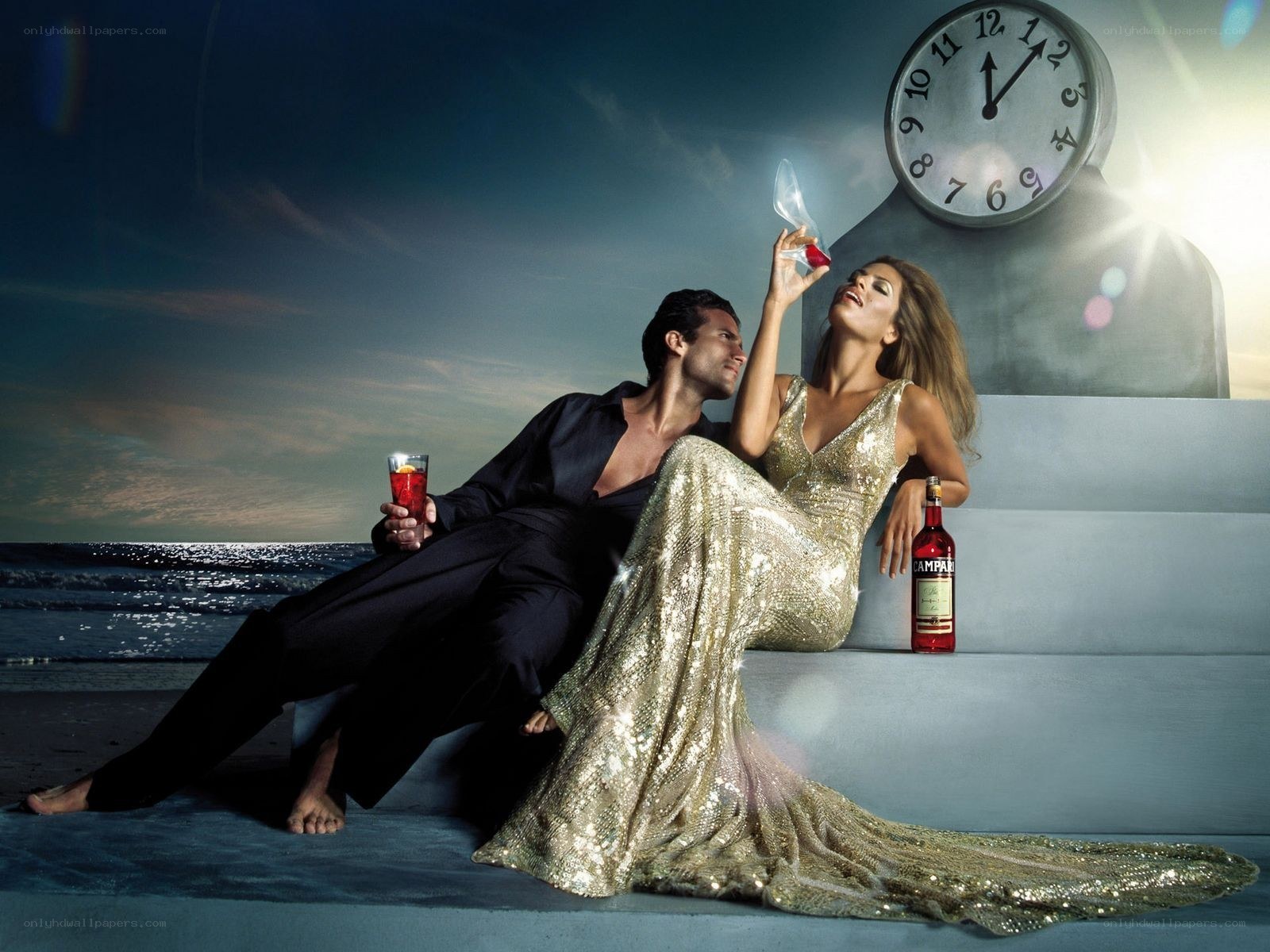 Couple on beach with Campari
