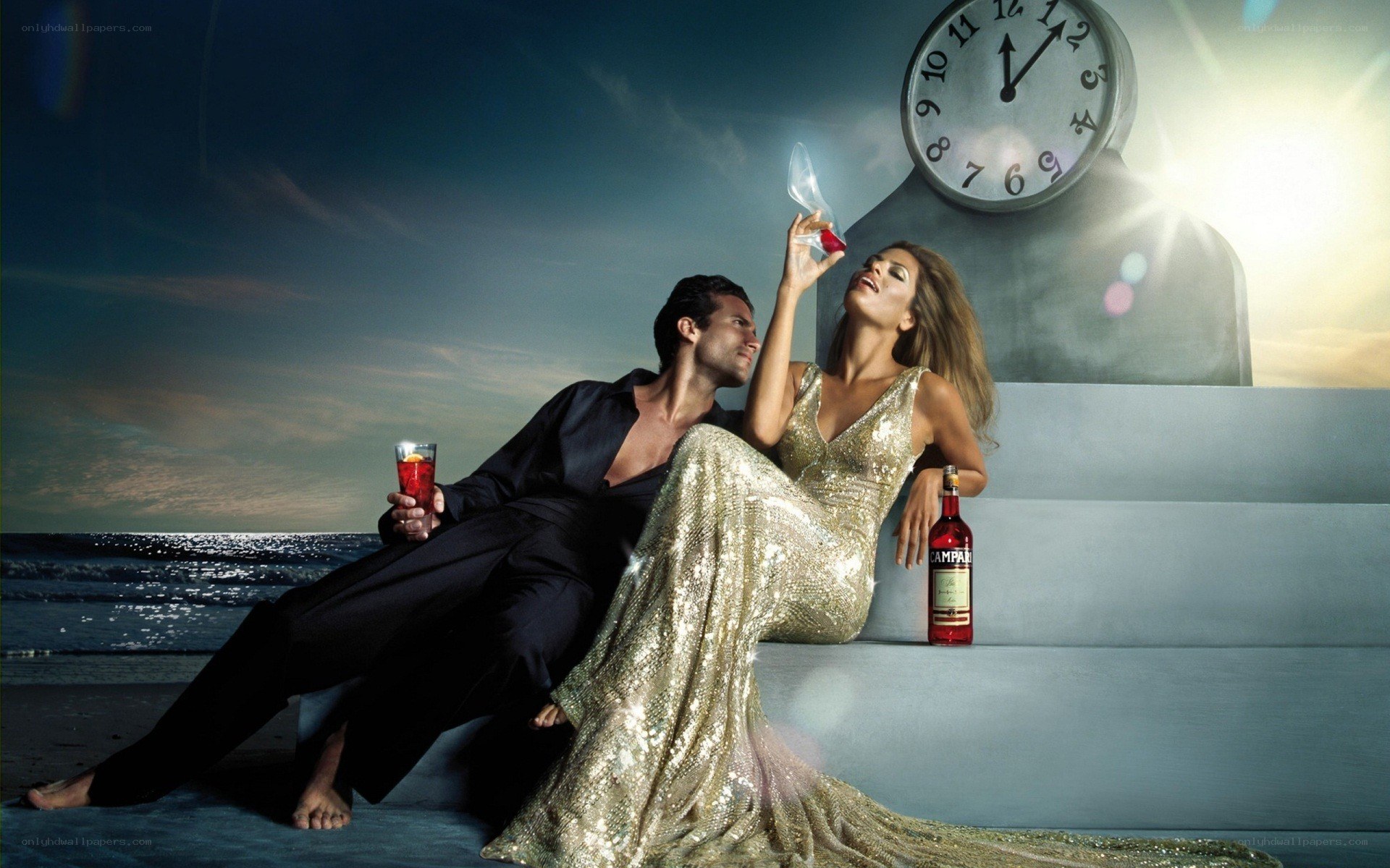 Couple on beach with Campari