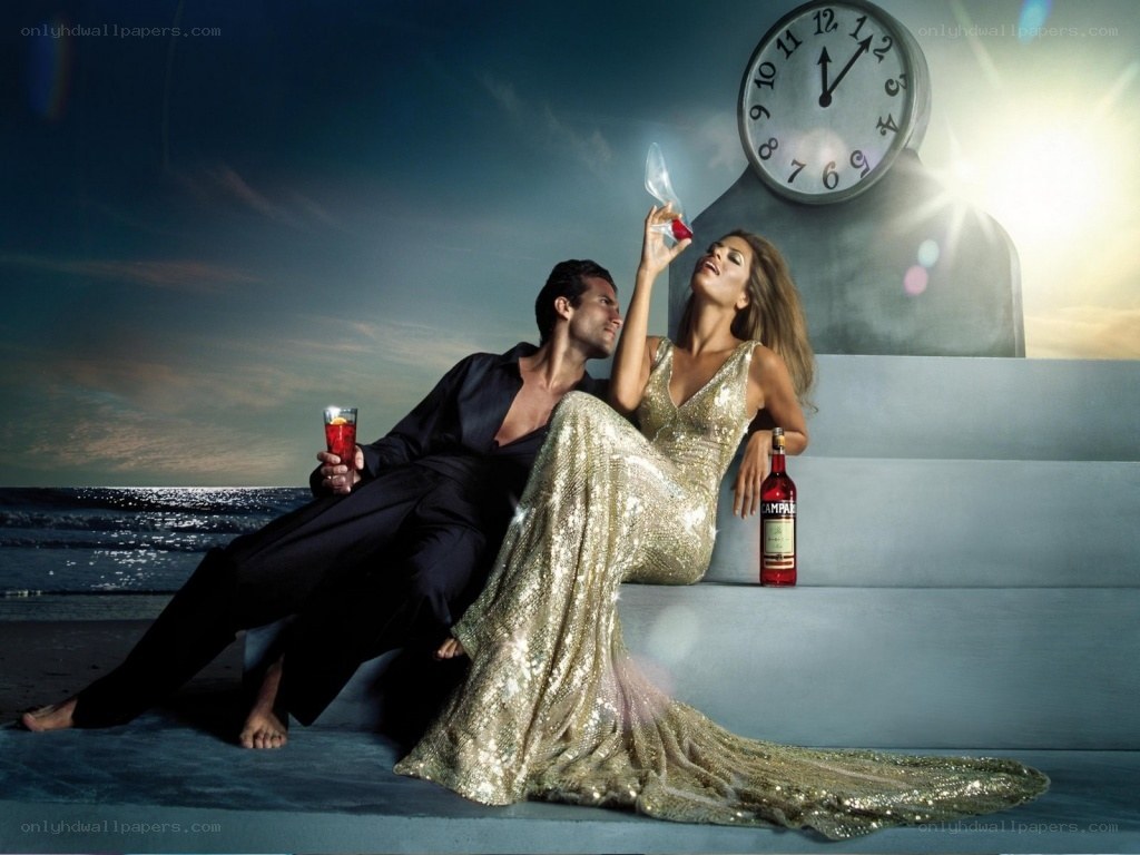 Couple on beach with Campari