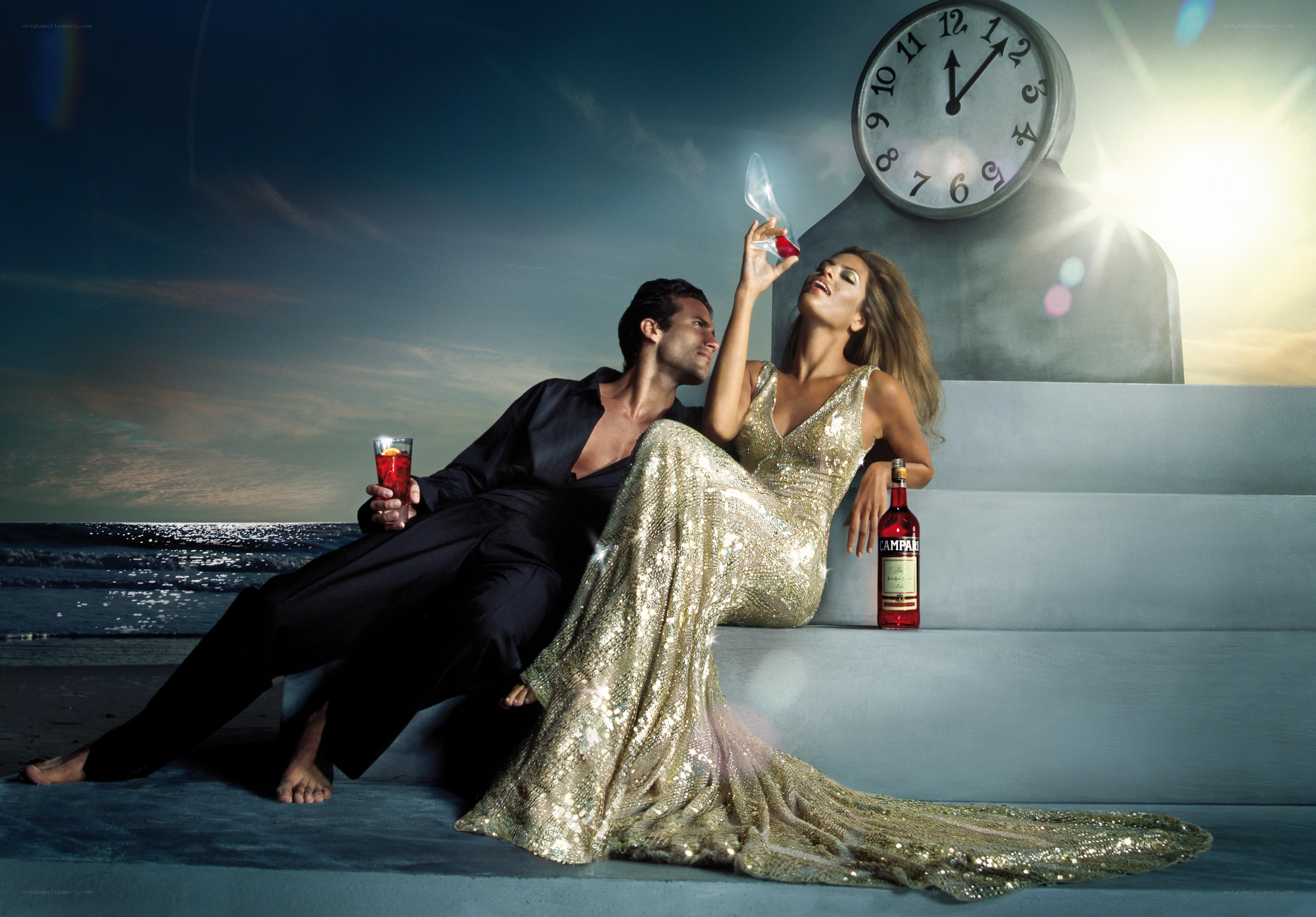 Couple on beach with Campari