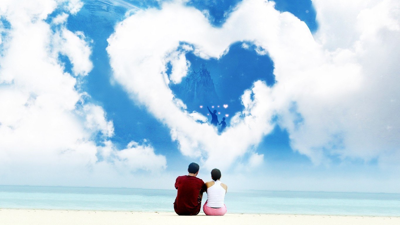 Couple on beach with heart cloud
