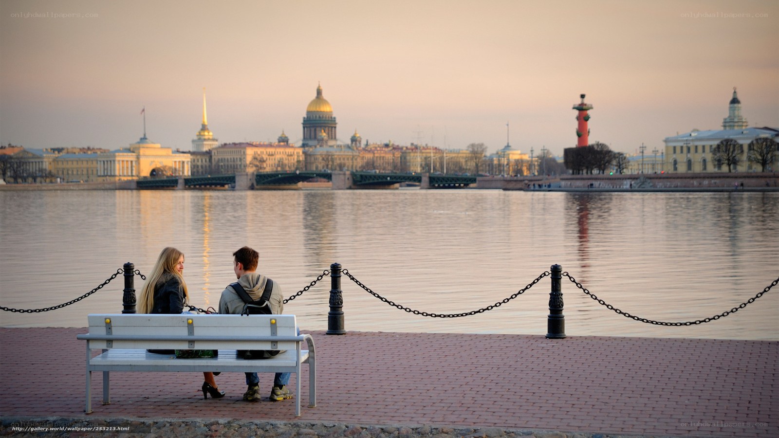 Couple on bench by river