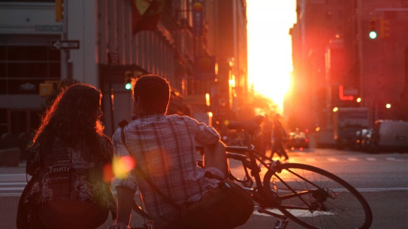 Couple on Bicycle at Sunset