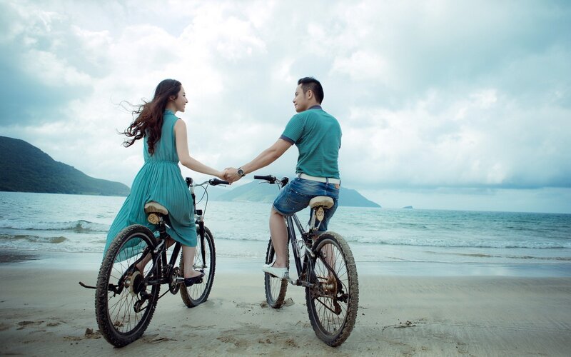 Couple on Bicycles — Blue